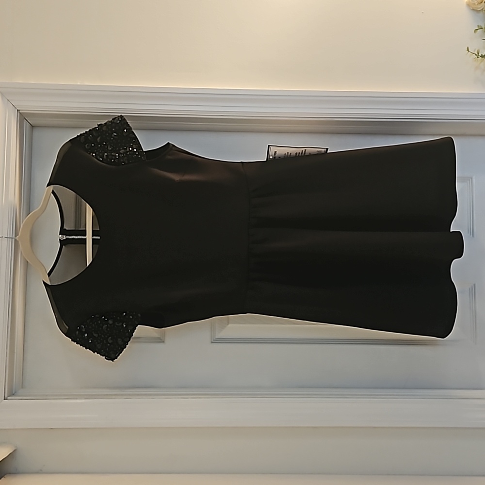 Black cocktail dress with shoulder details, size 11/12